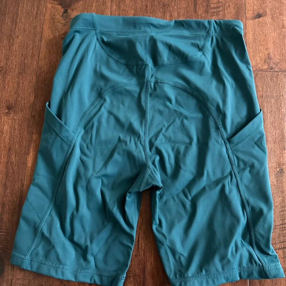 Orangetheory Teal Bike Shorts with Orange Accents and Socks - Picture 4 of 4